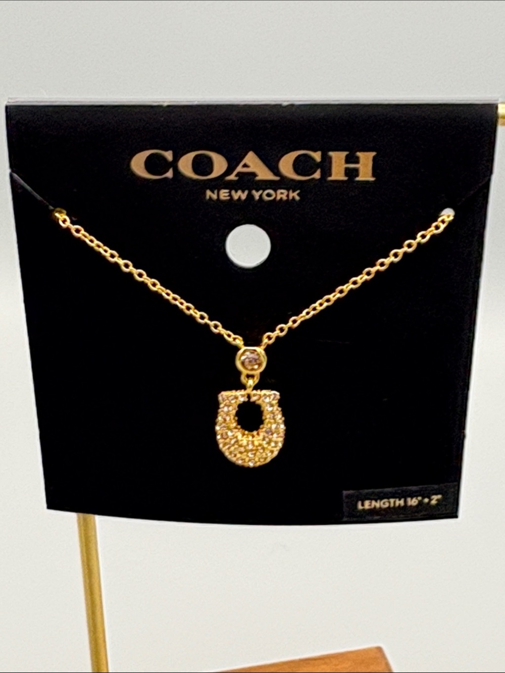 Coach Gold-Tone Pave Horseshoe Pendant Necklace